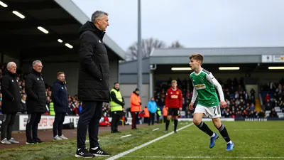 Glentoran Coach Tim McCann Watches Nervously as Son Lennon Competes in SuperCup NI