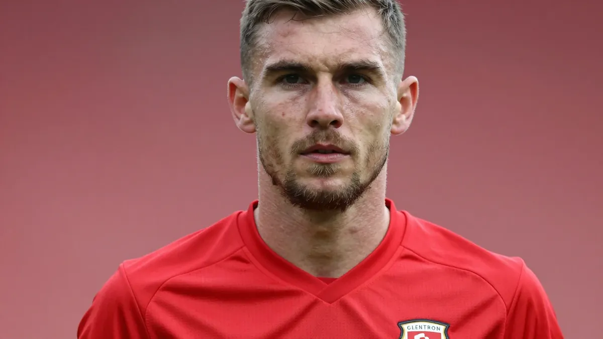 Conor McMenamin has made a spectacular return to Glentoran just two months after his high-profile move to Coleraine, in...